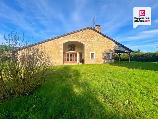 Bâtisse de caractère avec terrain constructible