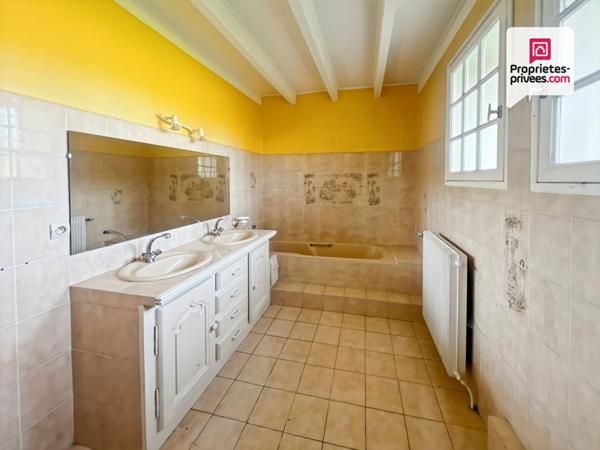 Bâtisse de caractère avec terrain constructible