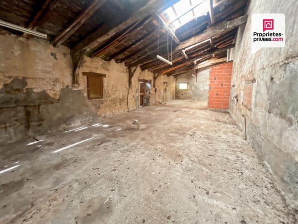 Bâtisse de caractère avec terrain constructible