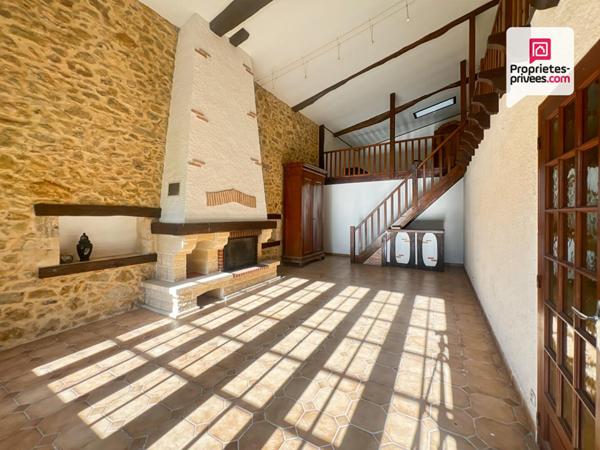 Bâtisse de caractère avec terrain constructible