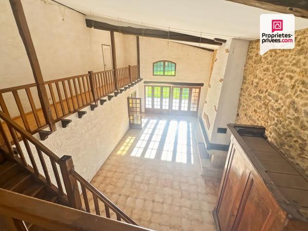 Bâtisse de caractère avec terrain constructible