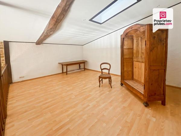 Bâtisse de caractère avec terrain constructible