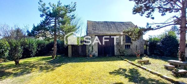 Maison de charme 9 pièces de 200m² avec garage et dépendance