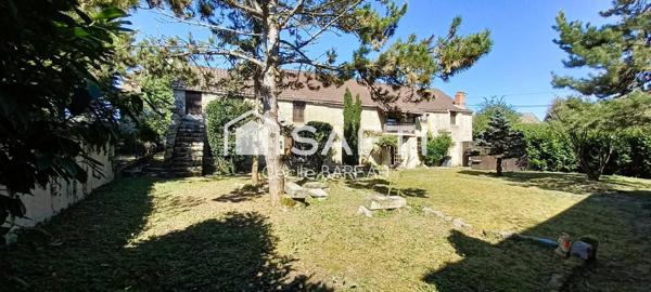 Maison de charme 9 pièces de 200m² avec garage et dépendance