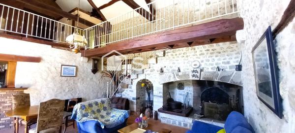 Maison de charme 9 pièces de 200m² avec garage et dépendance