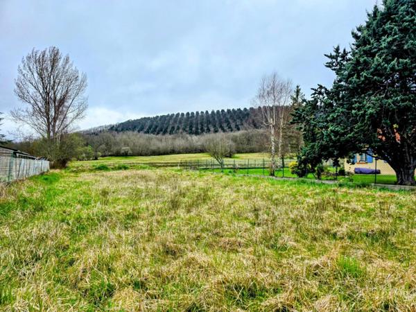 Ensemble immobilier avec maison, terrain constructible