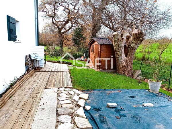 ARBONNE T4 AVEC JARDIN, TERRASSE, CAVE ET PLACE DE PARKING