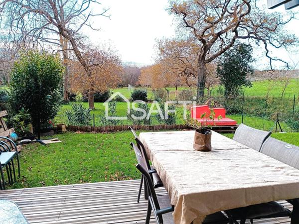 ARBONNE T4 AVEC JARDIN, TERRASSE, CAVE ET PLACE DE PARKING