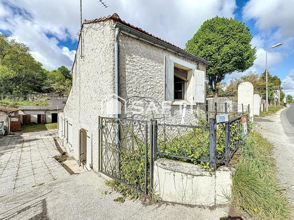 Maison de 60 m² avec dépendances et jardin