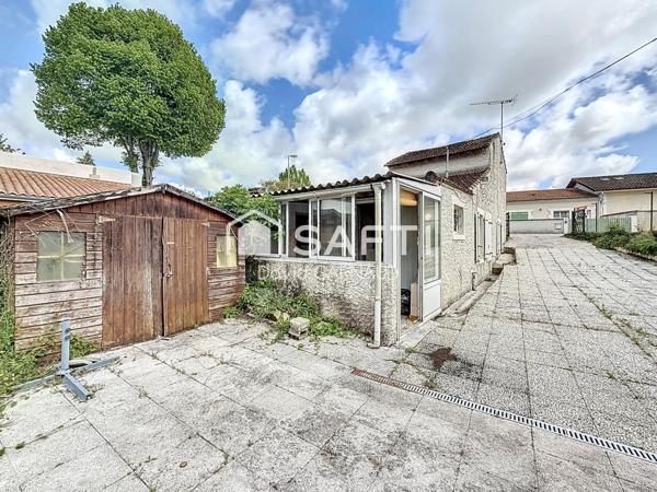 Maison de 60 m² avec dépendances et jardin