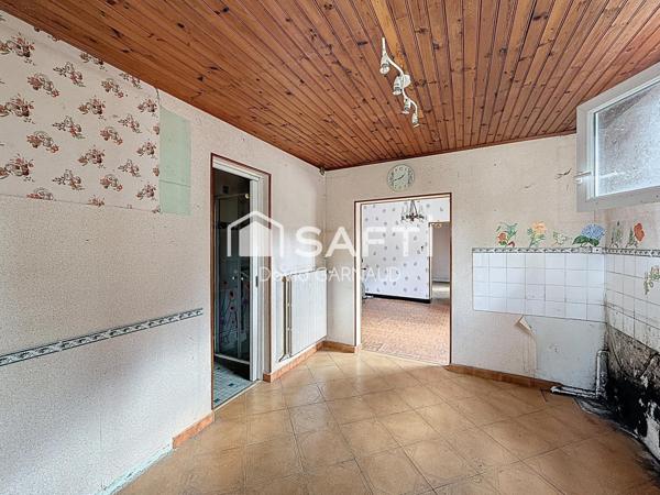 Maison de 60 m² avec dépendances et jardin