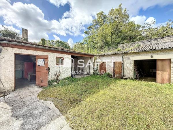 Maison de 60 m² avec dépendances et jardin