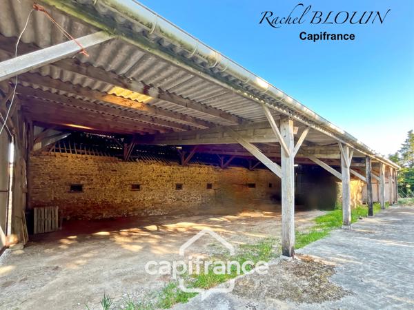 Grande étable en pierre de belle hauteur à rénover 226 m2 au sol sur terrain de 6 760 m2 à MARTIGNE FERCHAUD (35)