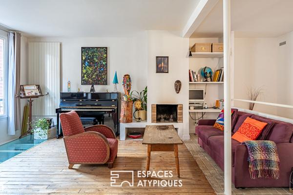 Duplex inversé comme une maison au coeur de Boulogne.