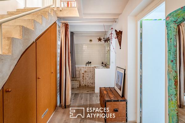 Duplex inversé comme une maison au coeur de Boulogne.