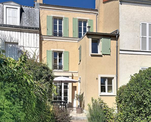 Une maison de famille avec jardin, à quelques minutes de Paris