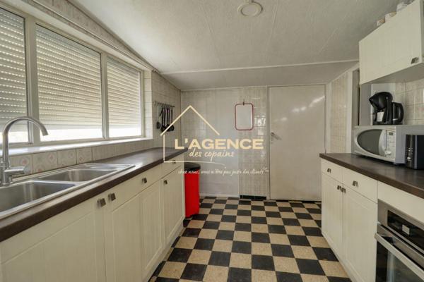 Semi-plain-pied de 143m2, garage et atelier