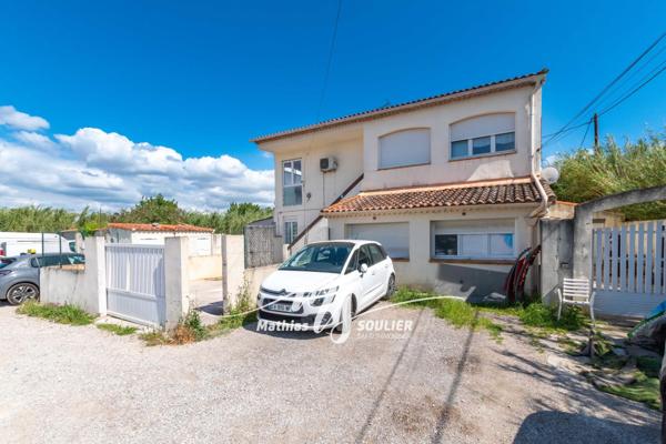 Maison de 200 m² en trois appartements