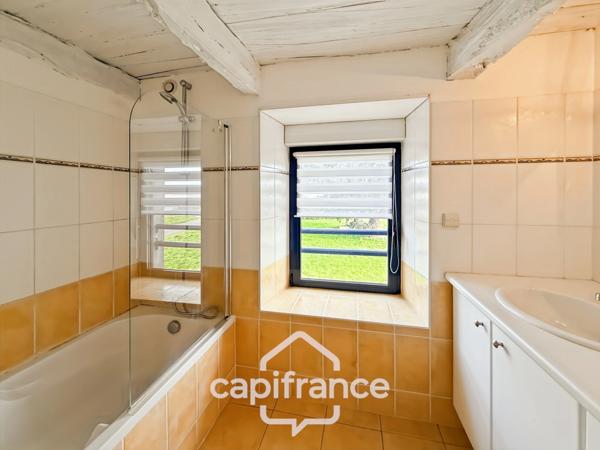 Maison en pierre rénovée – 300 m² habitables – 10 pièces – Terrain 2 800 m² – Réguiny – Garage – Vie de plain-pied