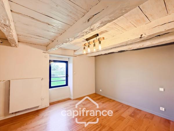 Maison en pierre rénovée – 300 m² habitables – 10 pièces – Terrain 2 800 m² – Réguiny – Garage – Vie de plain-pied