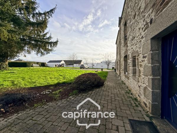 Maison en pierre rénovée – 300 m² habitables – 10 pièces – Terrain 2 800 m² – Réguiny – Garage – Vie de plain-pied