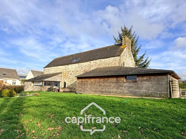 Maison en pierre rénovée – 300 m² habitables – 10 pièces – Terrain 2 800 m² – Réguiny – Garage – Vie de plain-pied