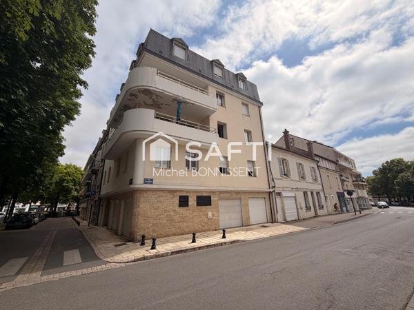Appartement avec ascenseur et garage plein centre ville .