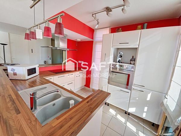 Bel appartement de 4 pièces, 2 places de parking et cave