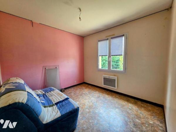 Maison de plain-pied 3 chambres avec garage sur 658 m², au calme d'une impasse