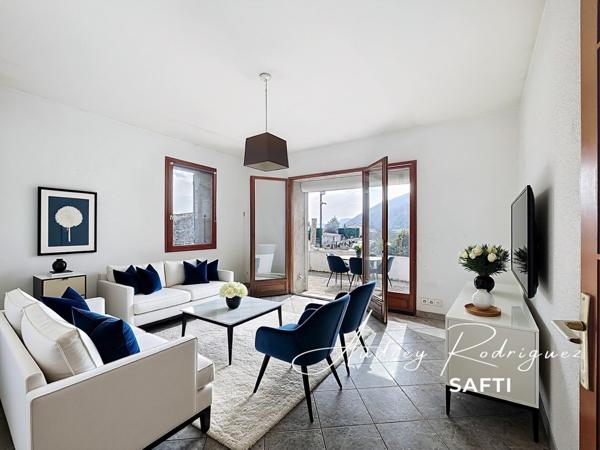 Maison avec terrasse et grand sous-sol