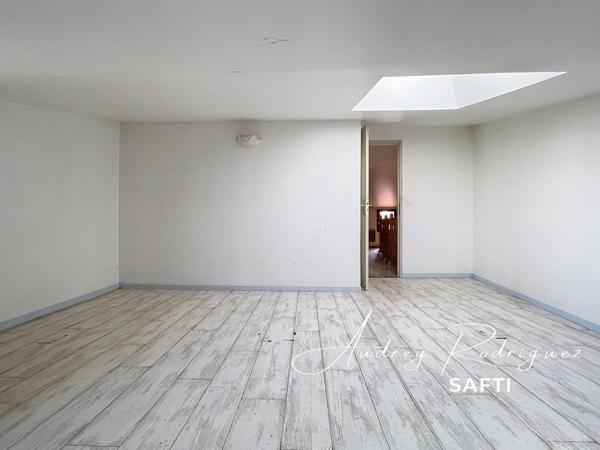 Maison avec terrasse et grand sous-sol