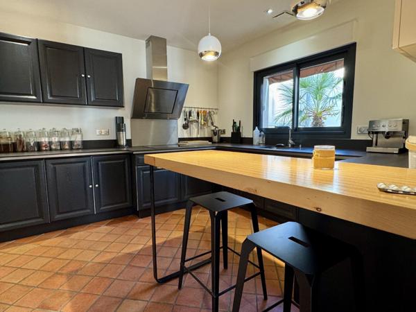 Maison + local commercial