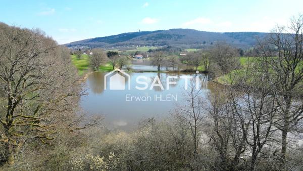 terrain 15000M², avec étang.