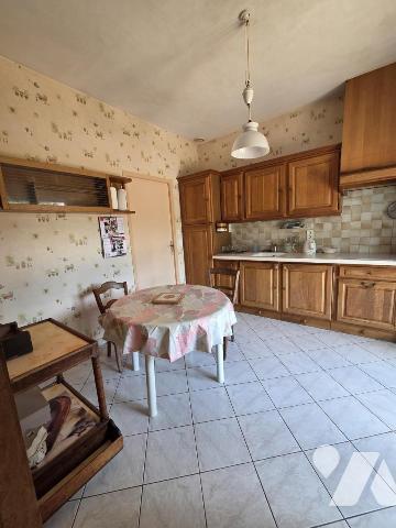Maison d'habitation avec terrain attenant.