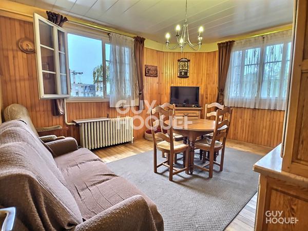 Appartement 3 pièces de 63 m² + Jardin partagé + Box + 2 caves