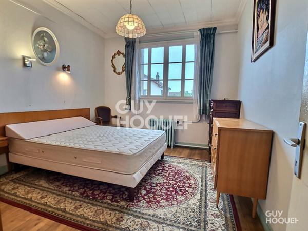 Appartement 3 pièces de 63 m² + Jardin partagé + Box + 2 caves