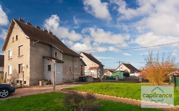 Maison mitoyenne de 100 m², combles aménageables, jardin et garage : une opportunité à Ciry-le-Noble