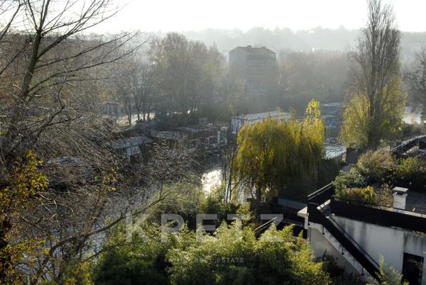 Maison d'architecte les pieds dans l'eau à 5 min du centre de Paris