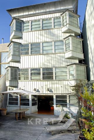 Maison d'architecte les pieds dans l'eau à 5 min du centre de Paris