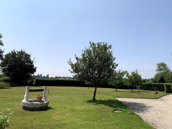 Jolie maison avec grand garage au calme