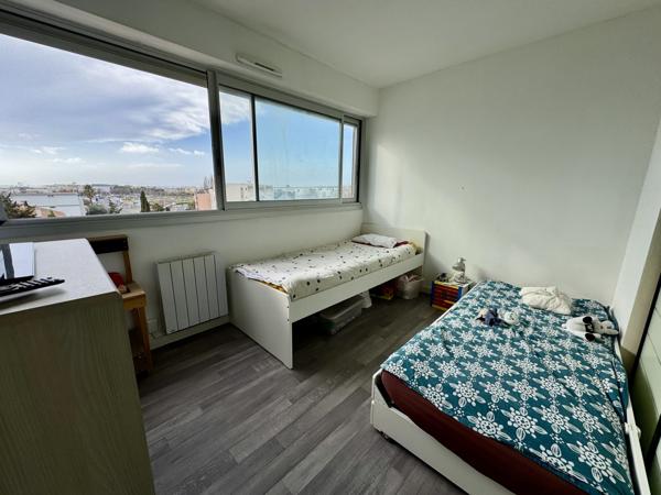 Palavas-les-Flots (34250) CARNON OUEST APPARTEMENT TRAVERSANT TYPE 3 TERRASSE ET PARKING