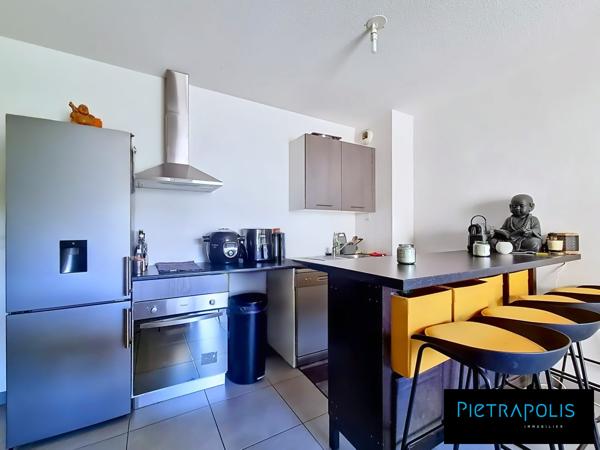 T2 46m² - étage élevé - terrasse couverte - garage en sous sol