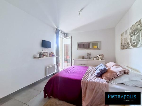 T2 46m² - étage élevé - terrasse couverte - garage en sous sol