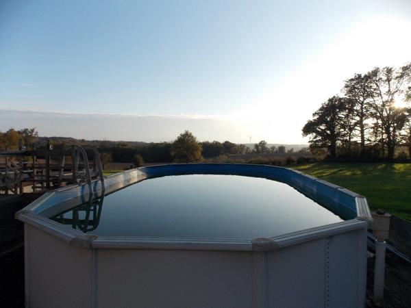 Charmante propriété individuelle en pierre rénovée avec grange, hangar, grand jardin, piscine et magnifique vue dégagée sur la campagne Les salles lavauguyon