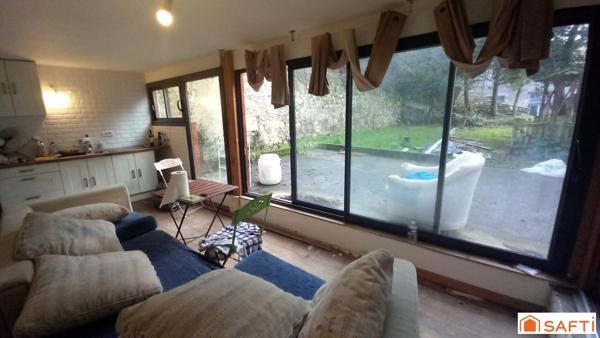 Maison familiale avec appartement jardin, garage et cuisine d'été