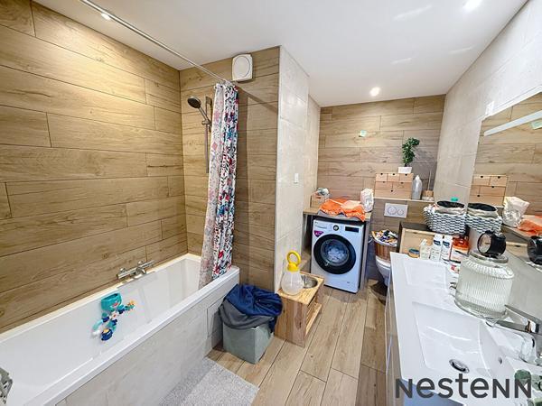 EXCLUSIVITÉ Coup de coeur - Appartement rénové avec soin avec garage et 2 places de parking privatives