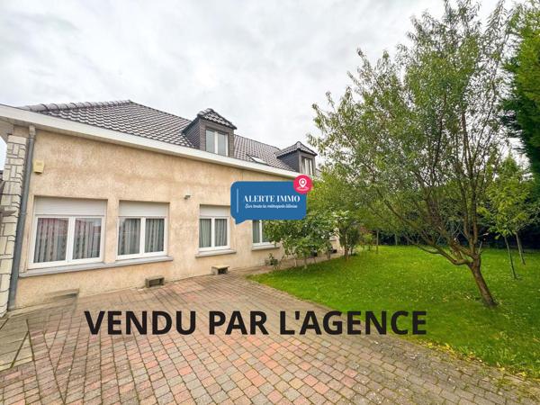 Large maison individuelle en retrait de rue de 282 m2 hab sur un terrain de 650 m2