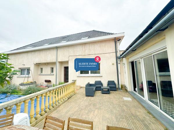 Large maison individuelle en retrait de rue de 282 m2 hab sur un terrain de 650 m2