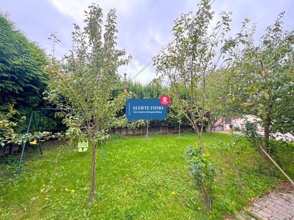 Large maison individuelle en retrait de rue de 282 m2 hab sur un terrain de 650 m2