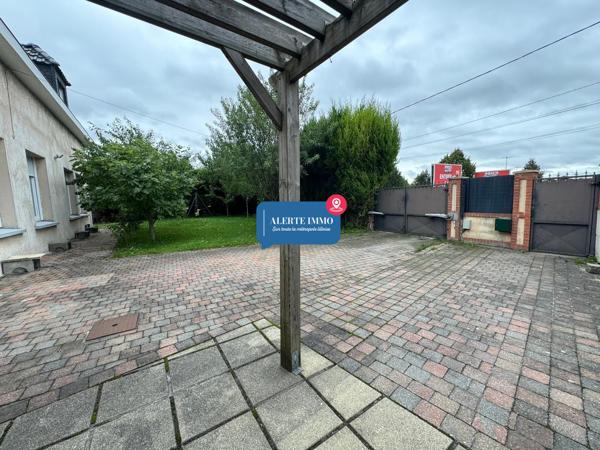 Large maison individuelle en retrait de rue de 282 m2 hab sur un terrain de 650 m2